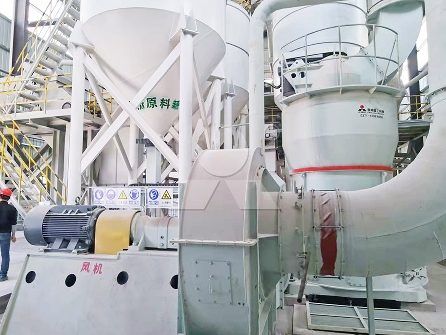 Modern industrial grinding plant with dust collection system in operation