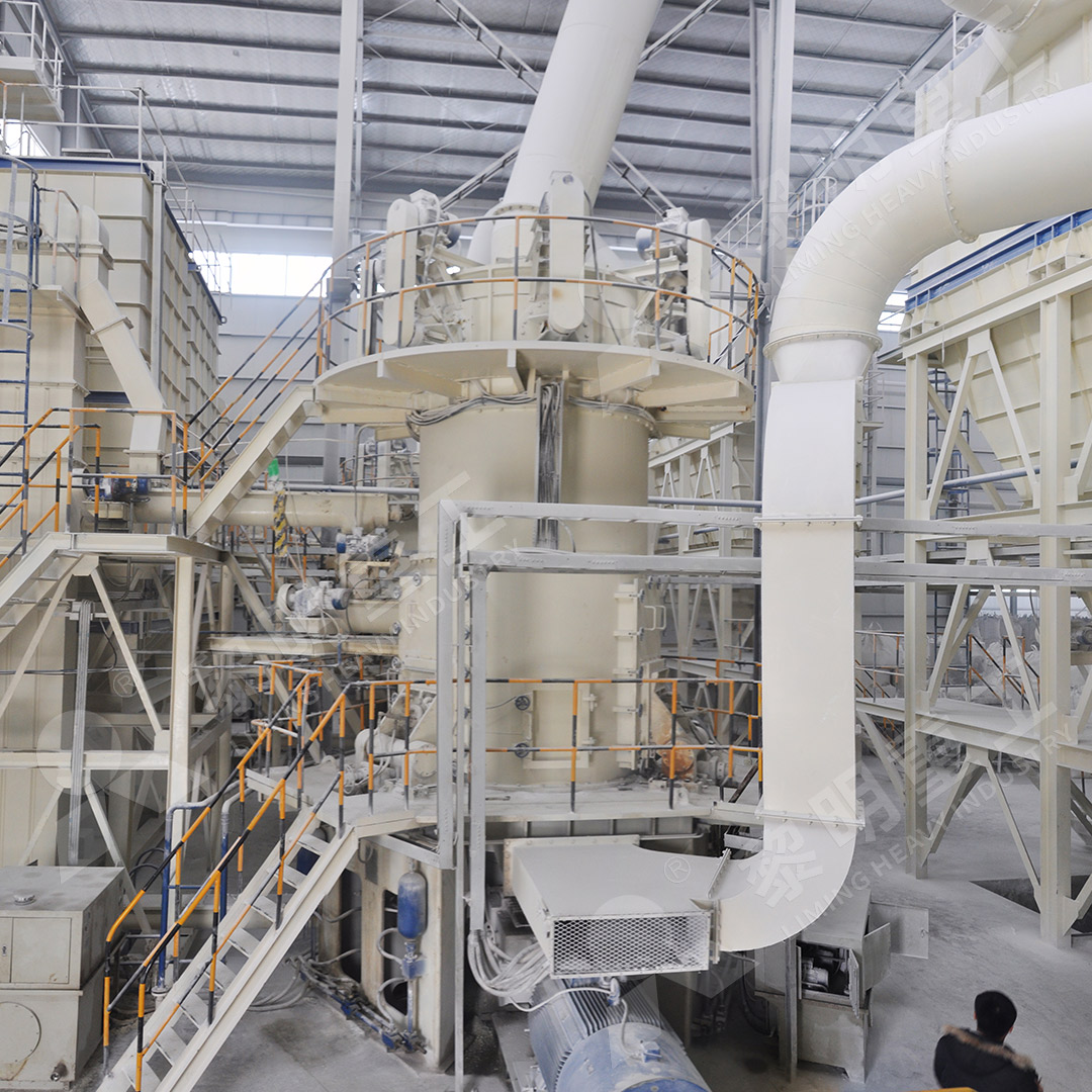 Graphite powder being ground in a modern vertical roller mill with separator and air flow system